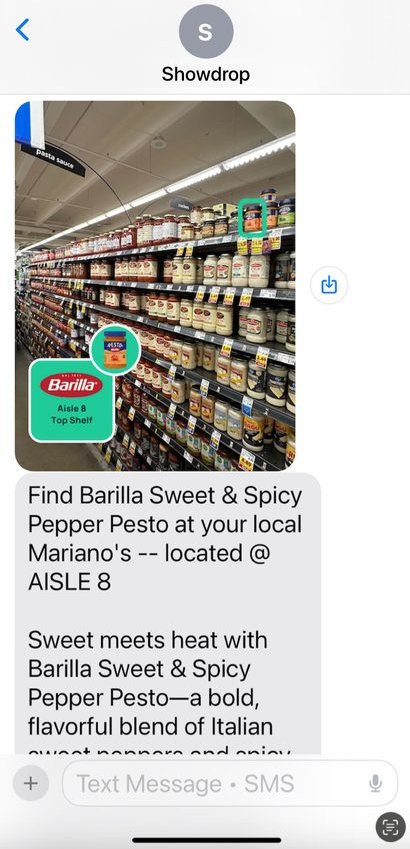 Text message locating Barilla pesto at Aisle 8 with a photo of the shelf